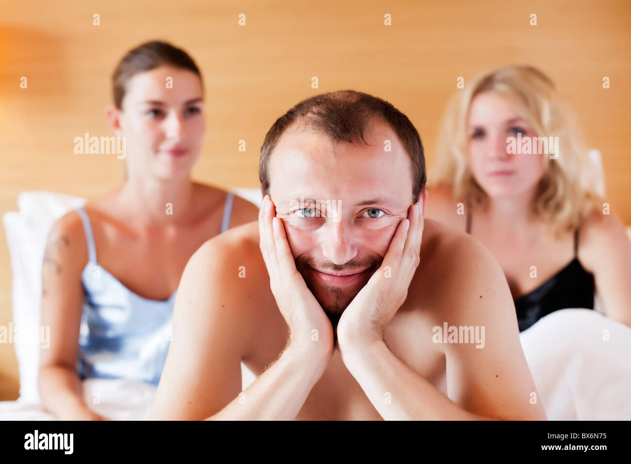 marriage, marital triangle, man, woman, women, bed, sex Stock Photo pic