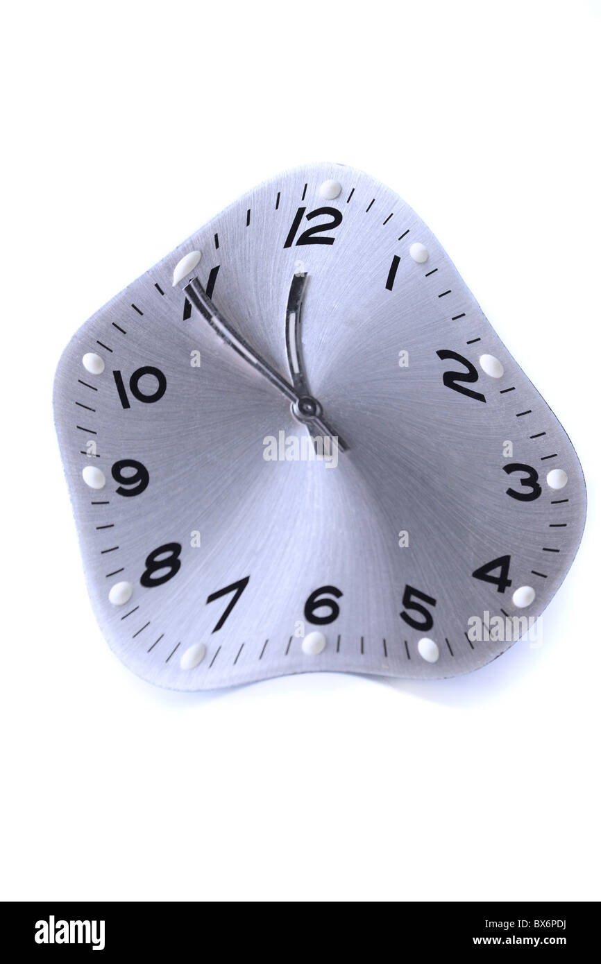 A clock shows five before twelve. All isolated on white background. Stock Photo
