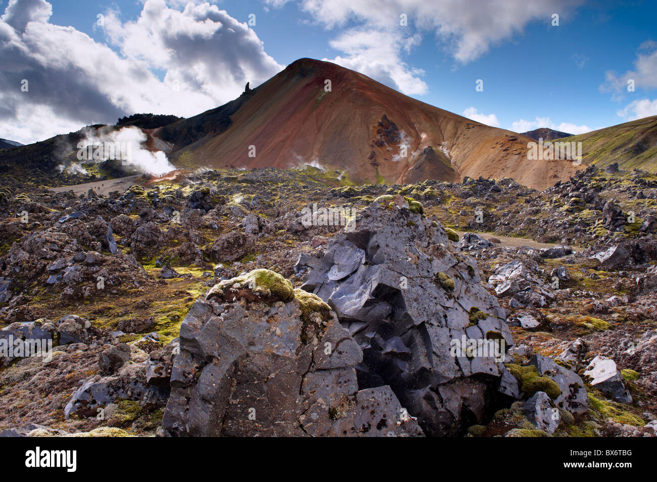 Brennisteinsalda, 855 m, Iceland's most colourful mountain, dominates the lava fields of Laugahraun, Iceland Stock Photo