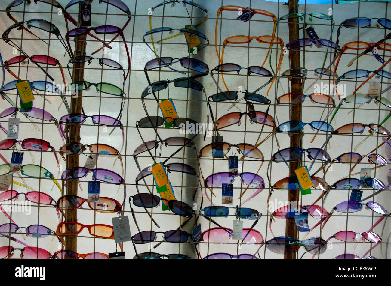 Colorful sunglasses for sale in China. Stock Photo