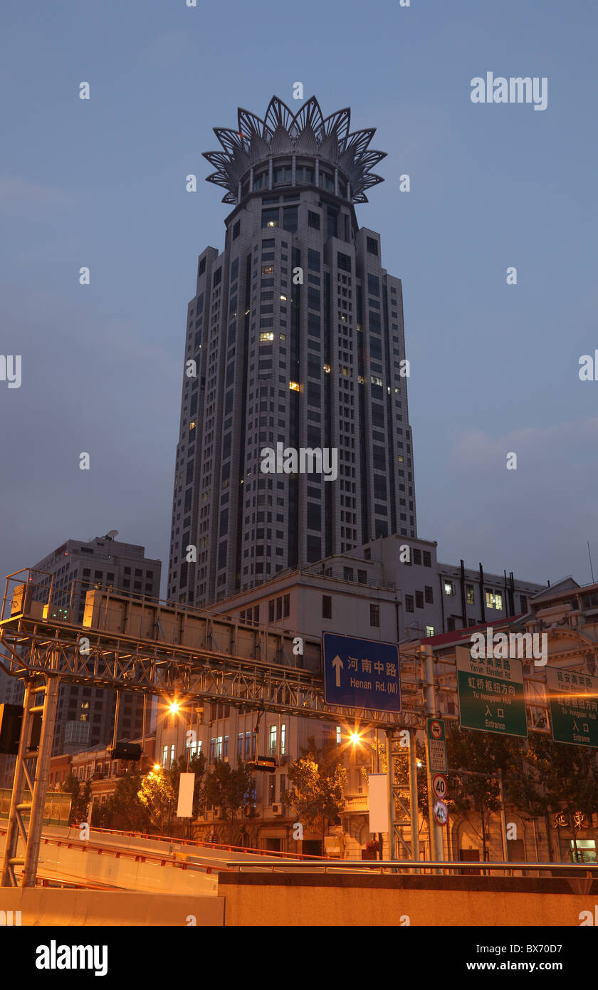 Highrise building of the WestIn Hotel with crown on top in Shanghai, China Stock Photo