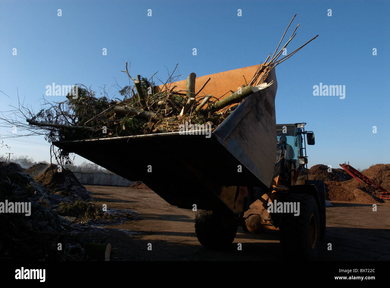 Green Waste Recycling Centre and digger UK Stock Photo Alamy