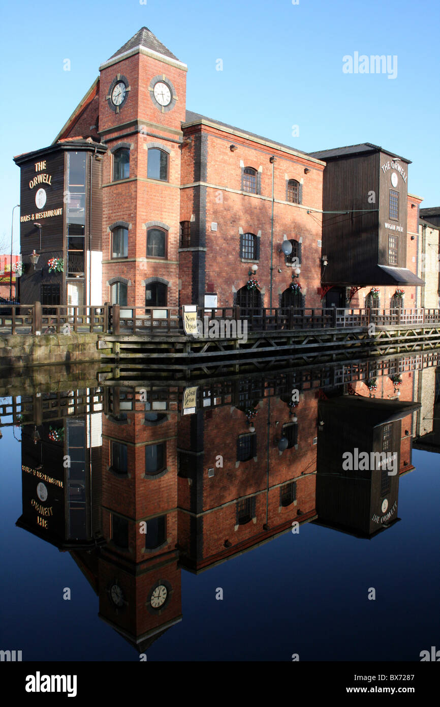Reflection Of 'The Orwell' Bar At Wigan Pier In The Leeds - Liverpool Canal, UK Stock Photo