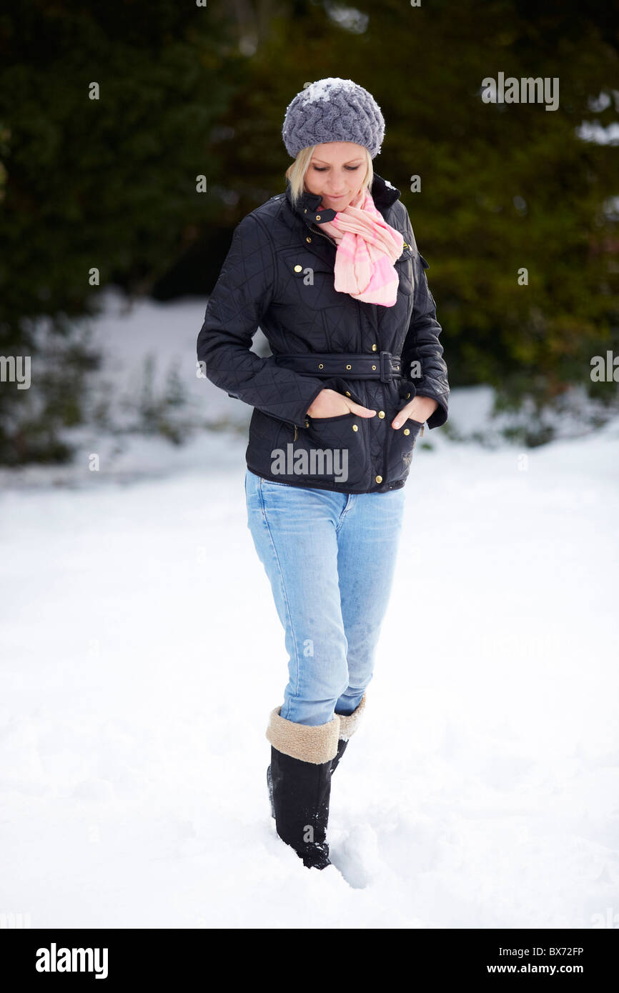 Girl in snow walking alone hi-res stock photography and images - Alamy
