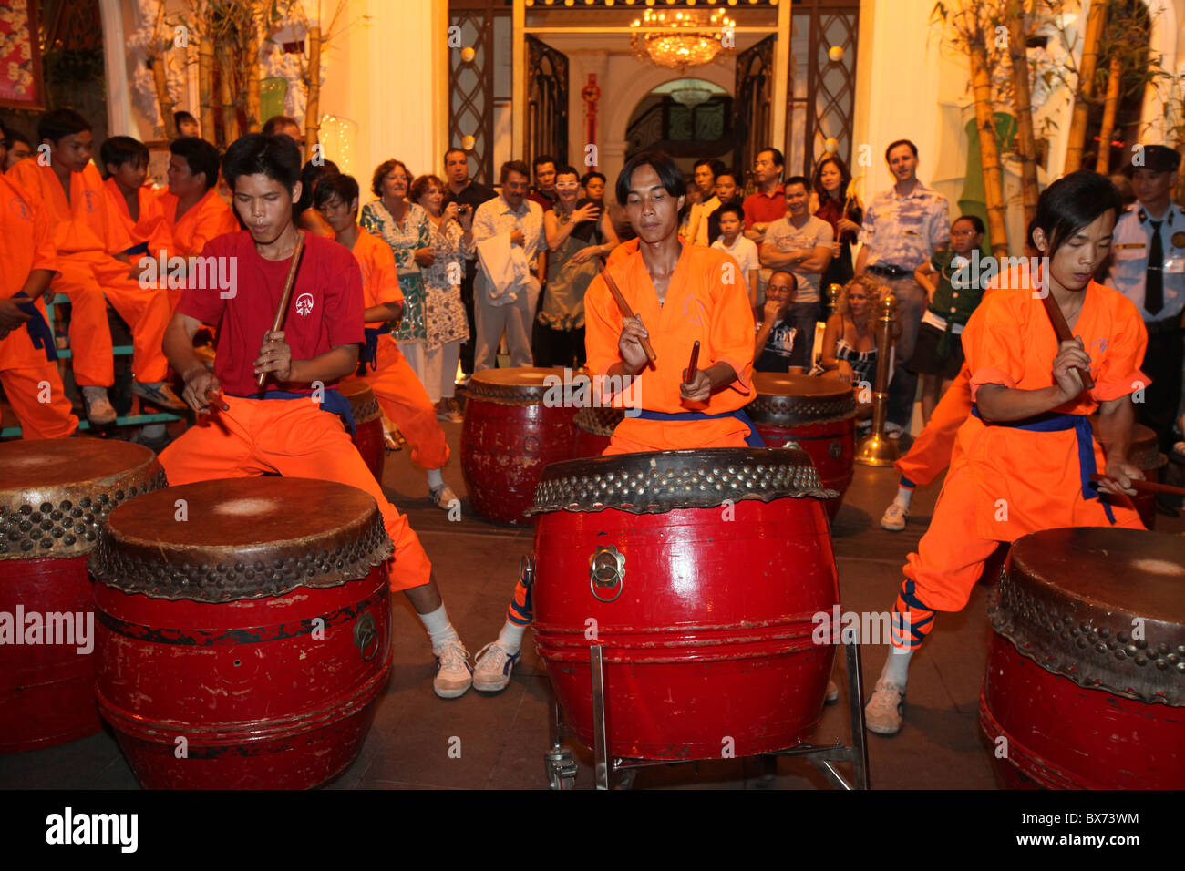 Drum and percussion music for the traditional Chinese New Year Lion Dance, Ho Chi Minh City, Vietnam, Indochina Stock Photo