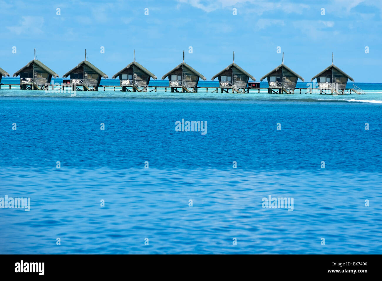 Resort bungalows over the sea, Maldives. Stock Photo