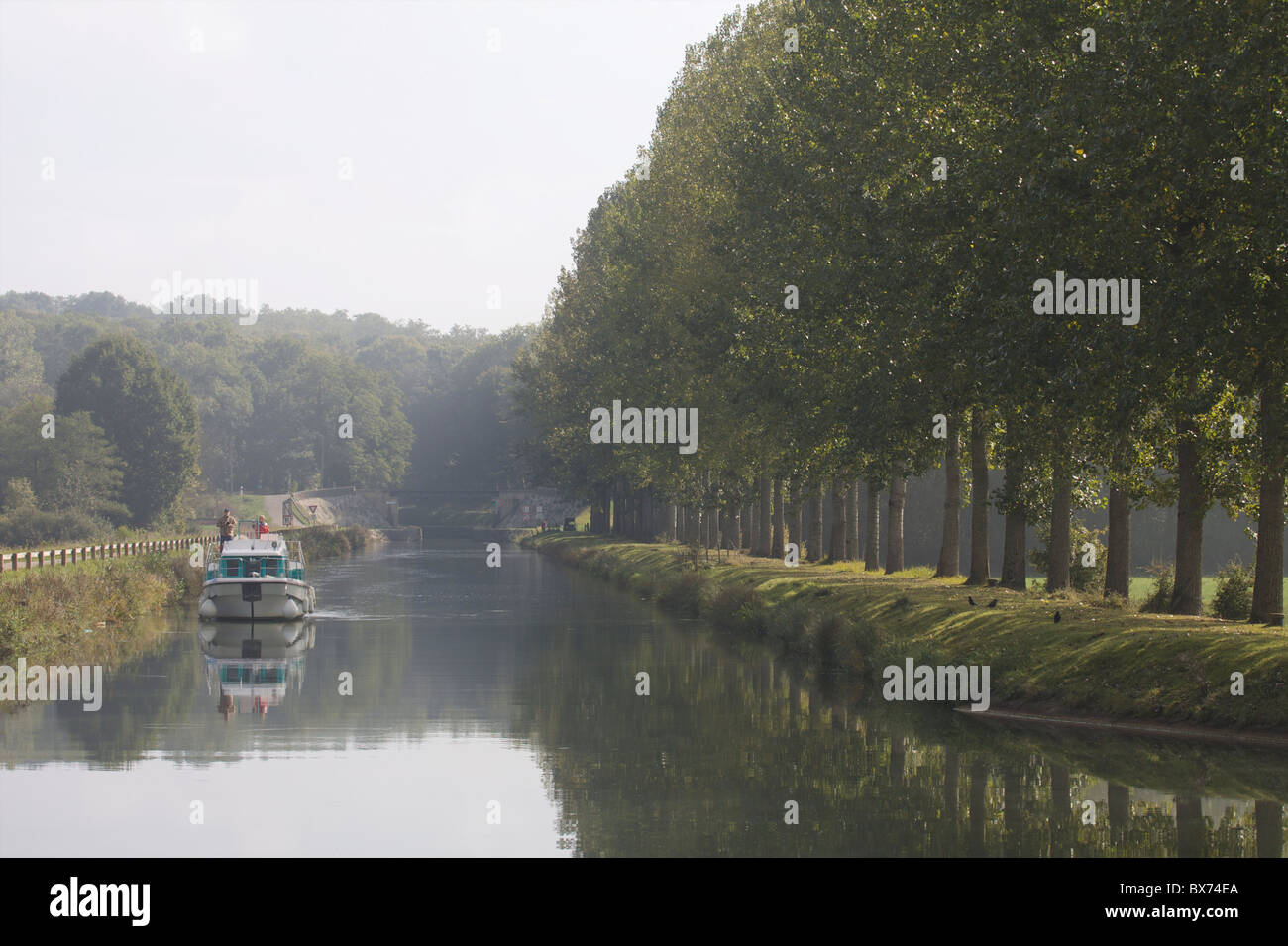 Navigation at dawn on the Saone river in Franche-Comte, France, Europe Stock Photo