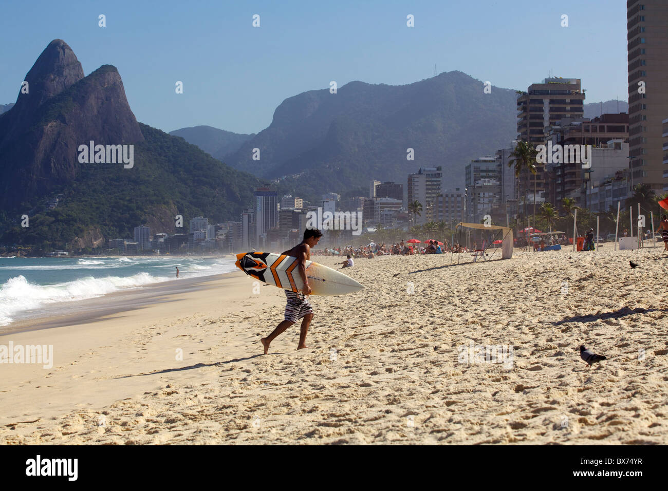 Surfing on Ipanema beach, Rio de Janeiro, Brazil, South America Stock Photo