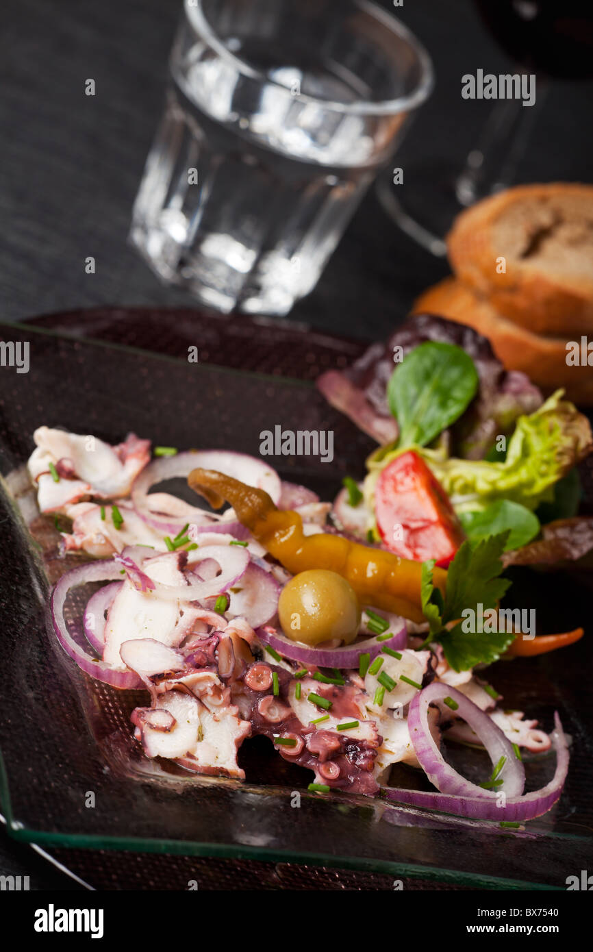 detail of a octopus carpaccio salad Stock Photo