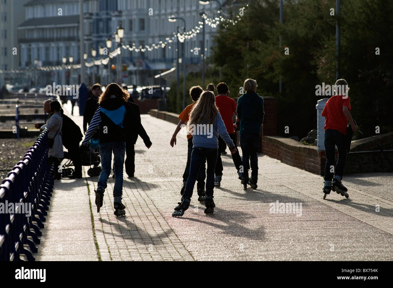kids children rollerskating rollerblading roller blades rollerblade