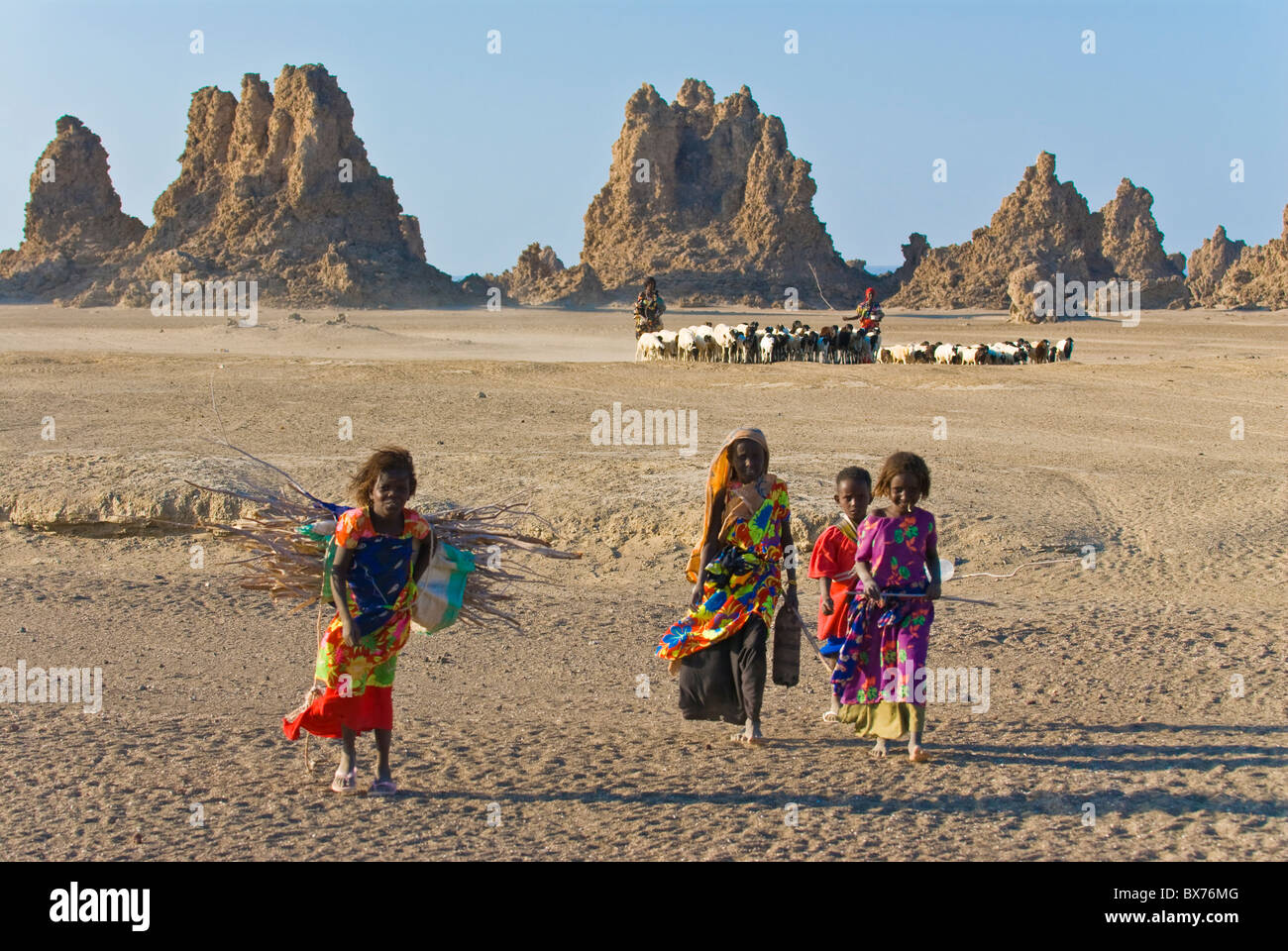 Local Afar children with their sheep, Lac Abbe (Lake Abhe Bad) with its chimneys, Republic of Djibouti, Africa Stock Photo