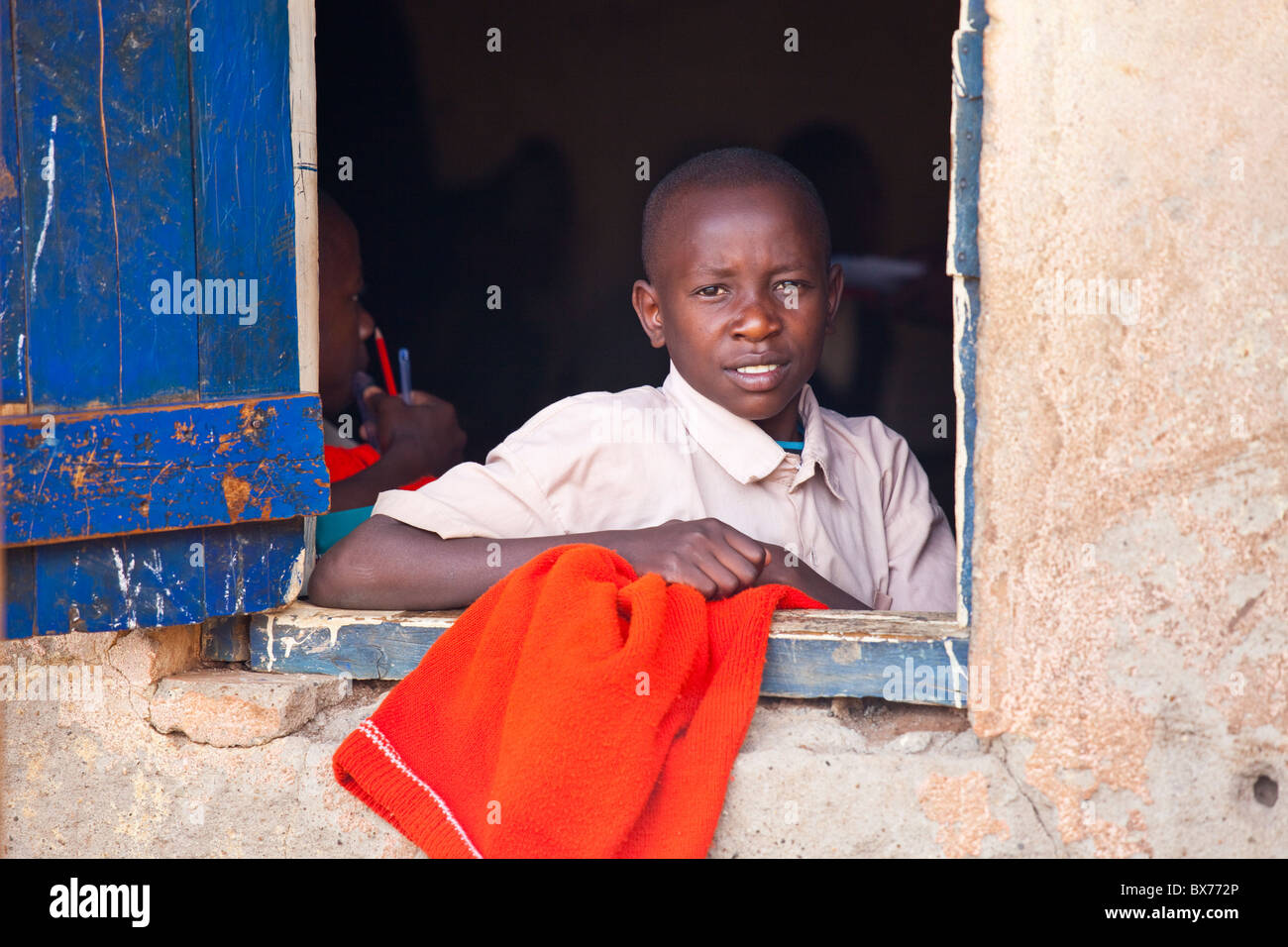 Boy in a primary school classrom in Kibera, Nairobi, Africa Stock Photo
