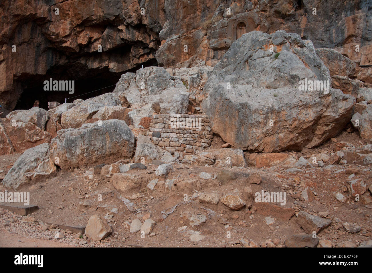 The grotto of the god Pan near the abandoned city of Caesarea Philippi. Stock Photo