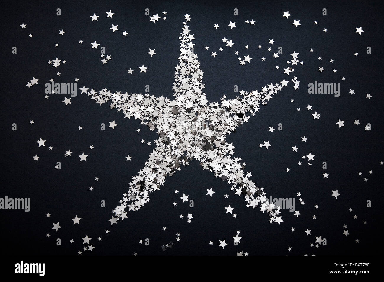 Star shape made of small stars Stock Photo
