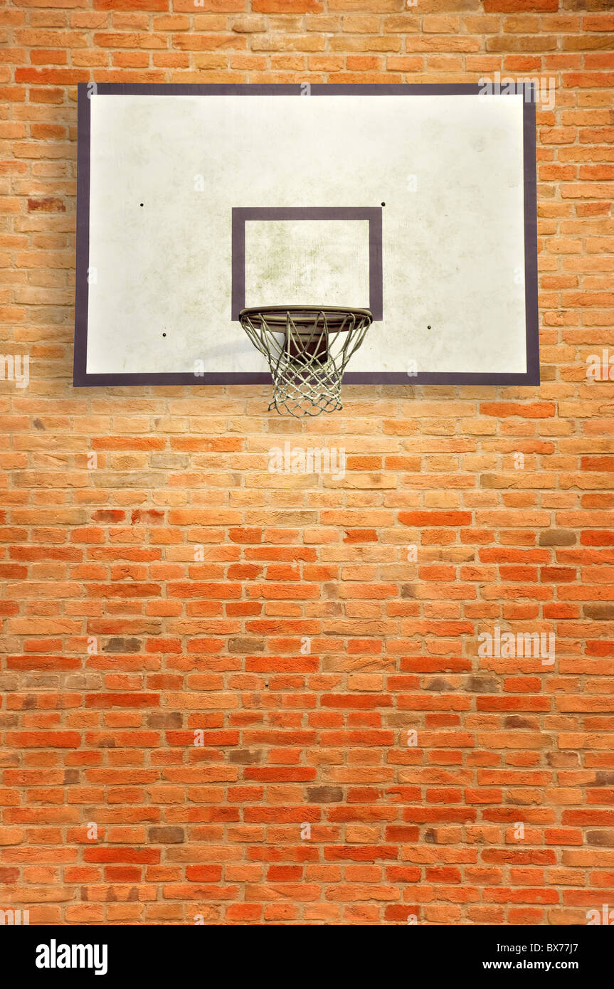 Basketball hoop and an empty outdoor court. Stock Photo
