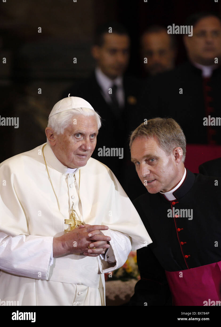 pope Benedict XVI., Pontiff's private secretary Monsignor Georg Gaenswein,  Infant Jesus of Prague, Our Lady of Victory Church Stock Photo - Alamy