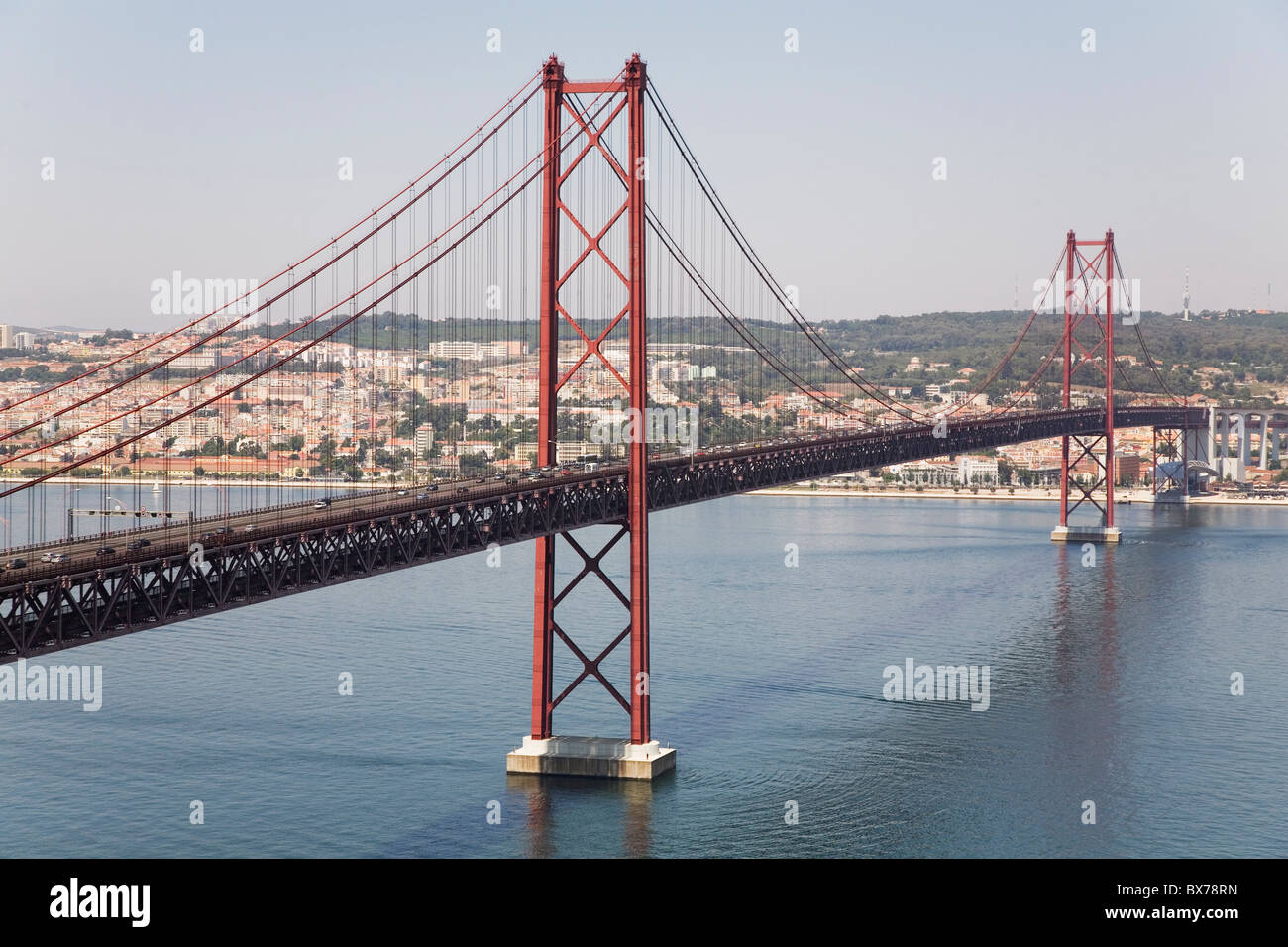 The 25 April Suspension (Ponte 25 de Abril) spans the River Tagus (Rio Tejo) in Lisbon, Portugal, Europe Stock Photo