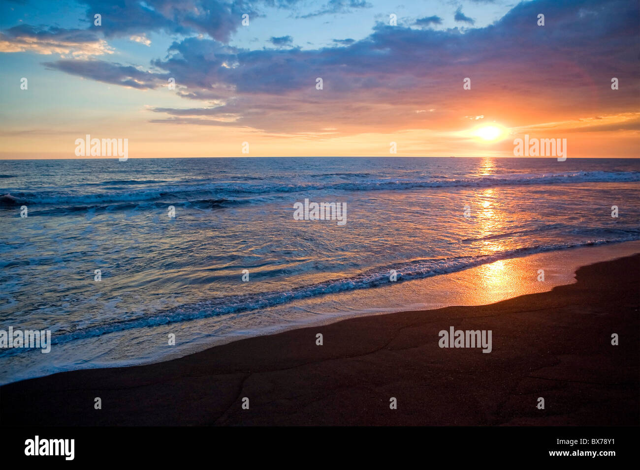 Monterrico black sand beach at sunset, Guatemala Stock Photo