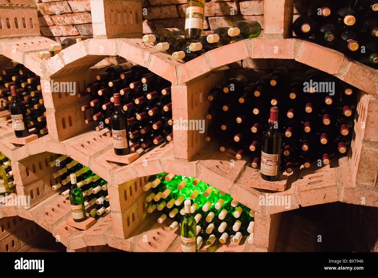 stacked bottles inside a wine cellar Stock Photo Alamy