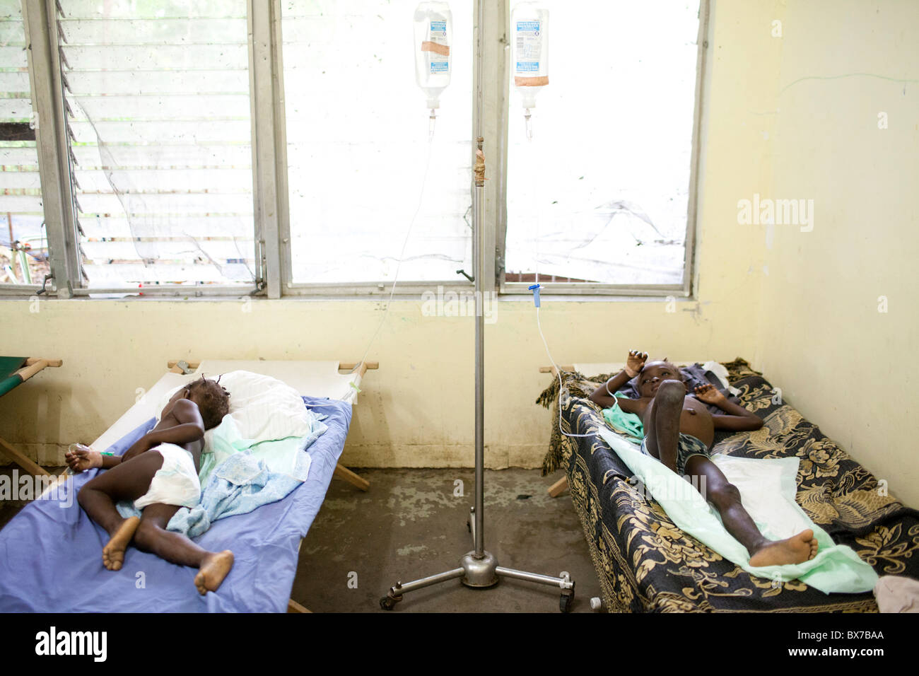 Young cholera patients sleep on cots at the Hospital Albert Schweitzer on Thursday, October 28