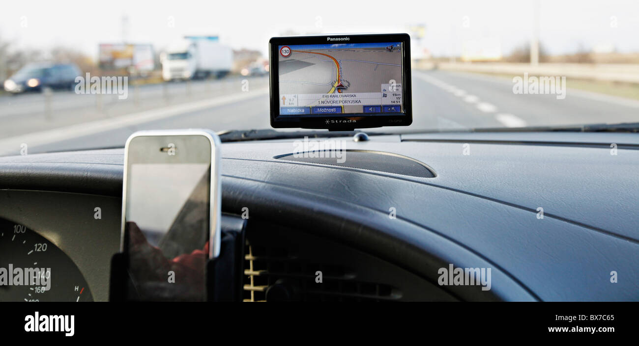 Panasonic Strada GPS navigation and iPhone in a car Stock Photo - Alamy