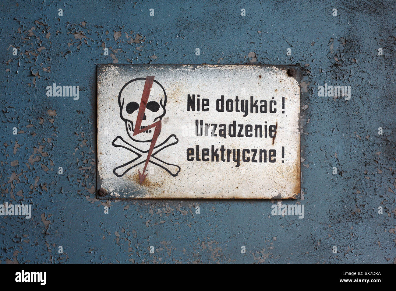 Signboard in a factory warns: Do not touch! Electrical appliance!, Poznan, Poland Stock Photo
