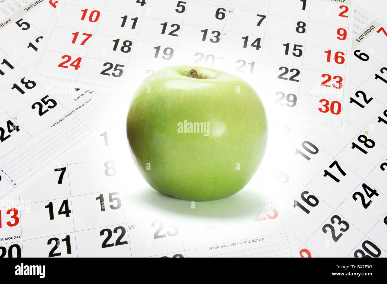 Apple and Calendar Pages Stock Photo Alamy