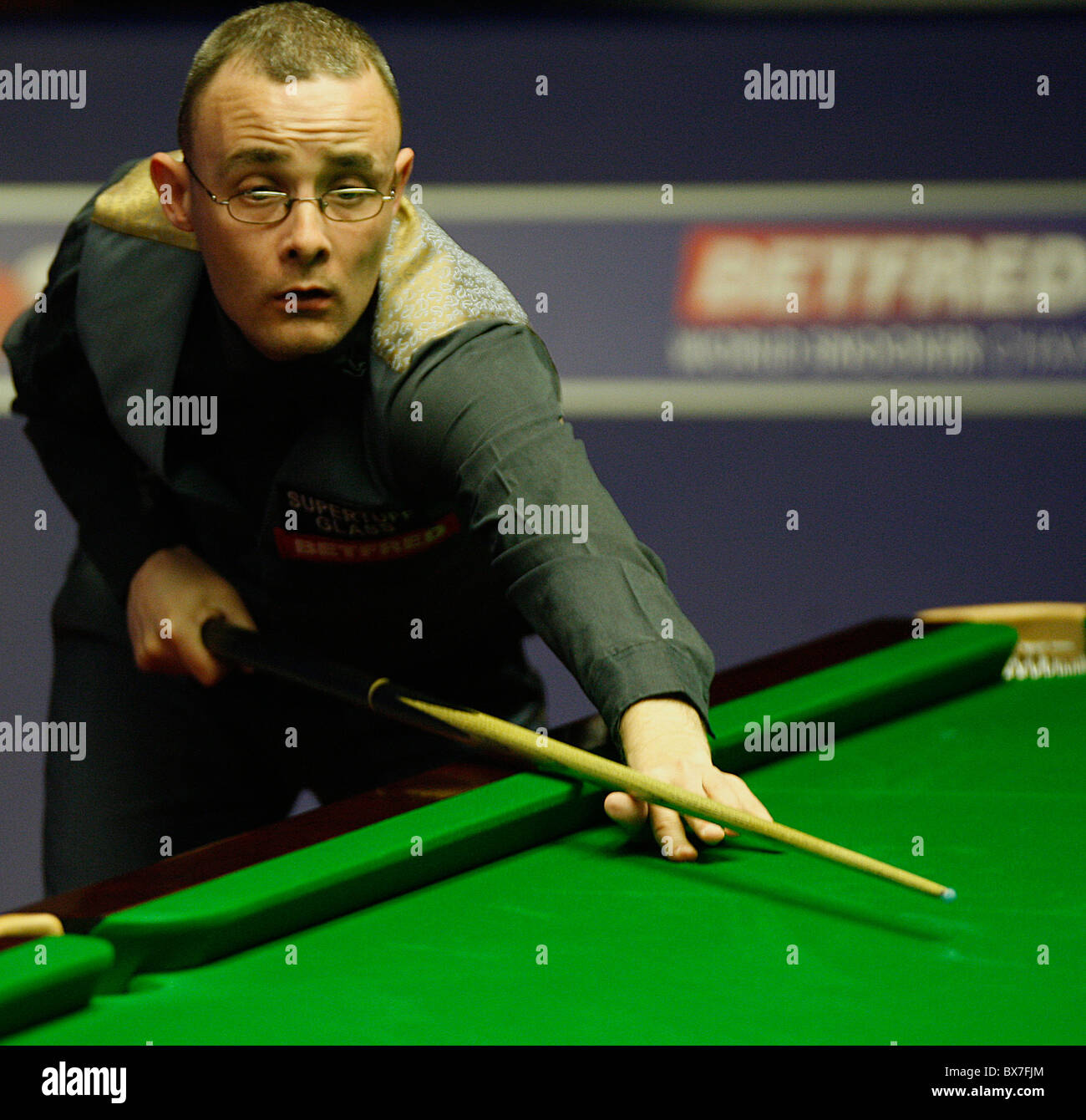 Martin Gould of England in action against Marco Fu of Hong Kong (not in pic), during the 1st Round of the Betfred World Snooker Stock Photo