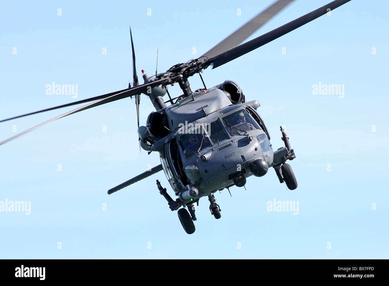MH-60G Blackhawk CSAR Combat Search & Rescue helicopter in flight during the 2010 San Francisco Fleet Week Airshow. Stock Photo