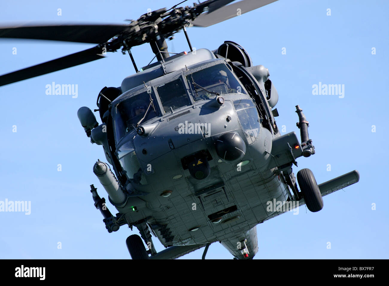 MH-60G Blackhawk CSAR Combat Search & Rescue helicopter in flight during the 2010 San Francisco Fleet Week Airshow. Stock Photo