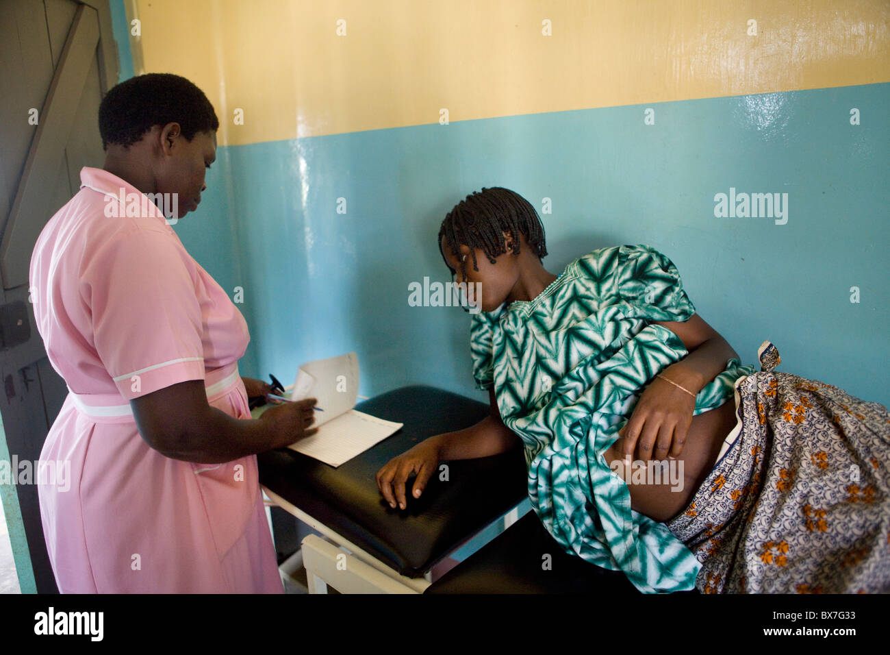 A pregnant woman receives a maternal exam in hospital in Amuria District, Teso Subregion, Uganda, East Africa. Stock Photo