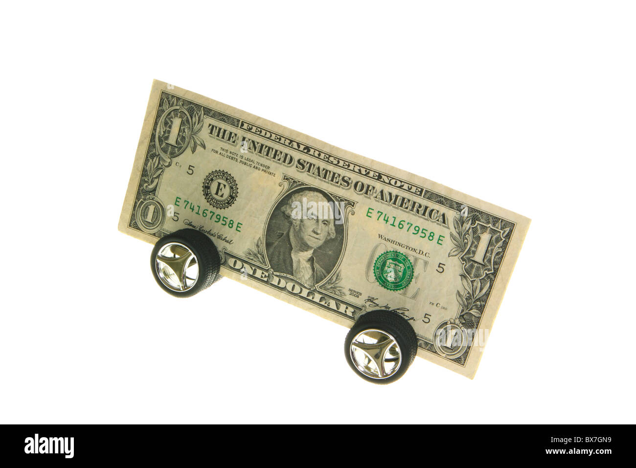 dollar bill on wheels Stock Photo