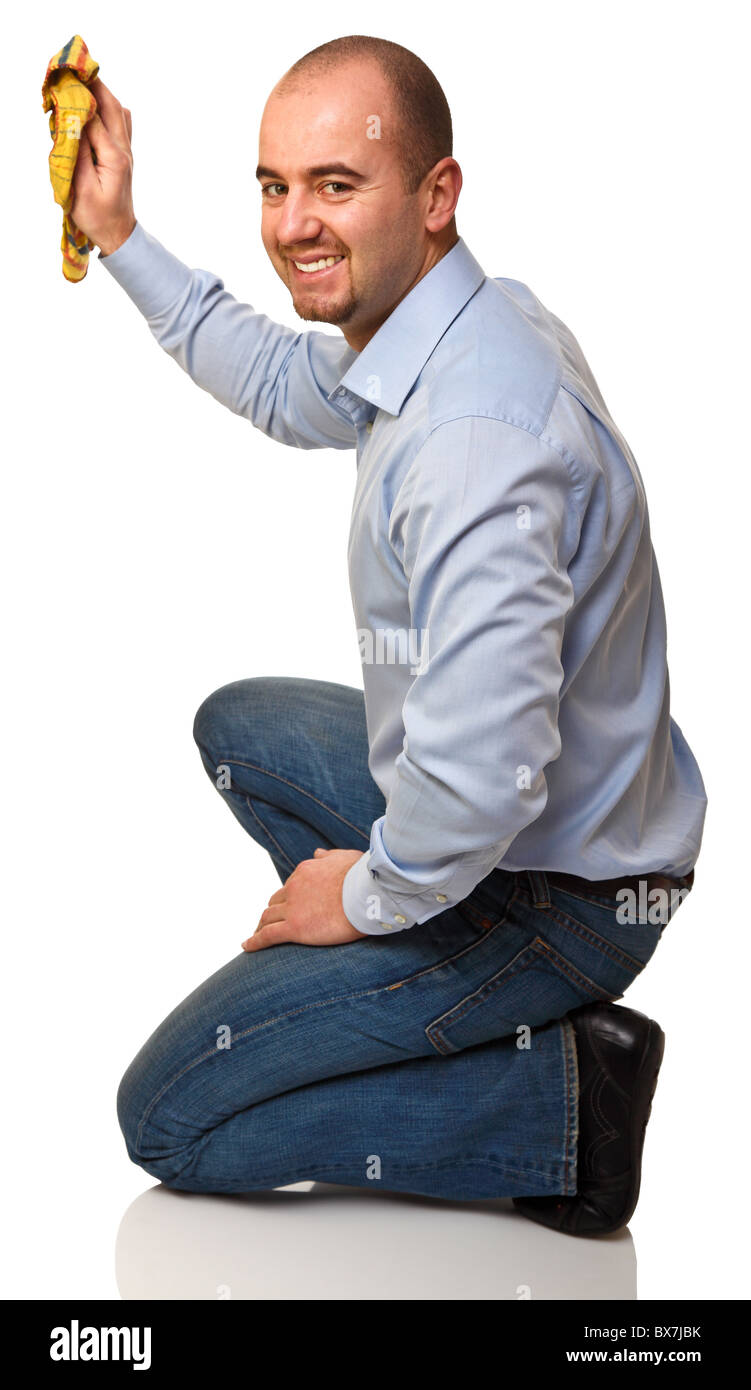 portrait of white man cleaning isolated on background Stock Photo