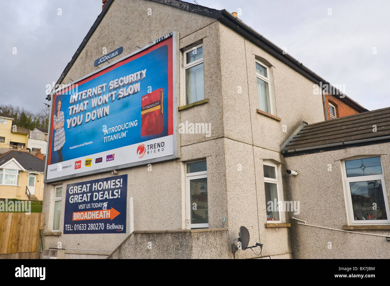 JCDecaux billboard site featuring advertising poster for Internet Security on end wall of building Stock Photo