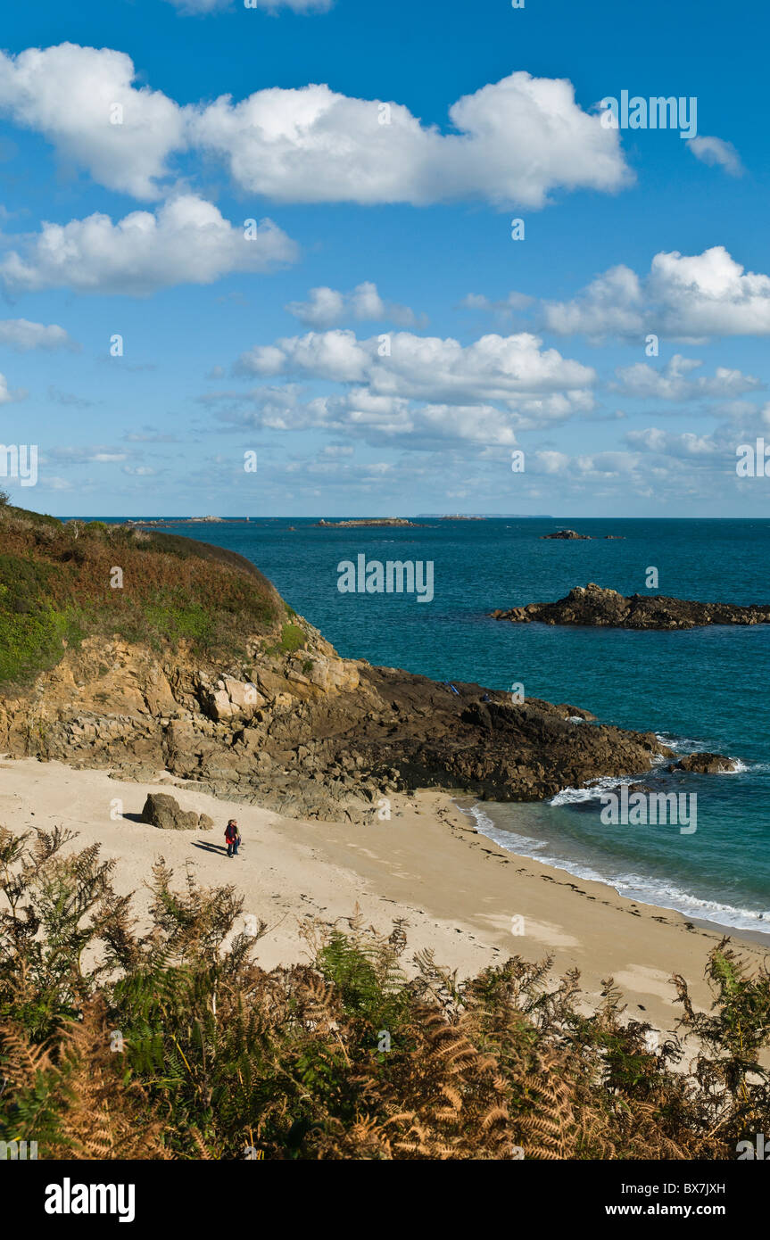 dh Herm Island HERM GUERNSEY Women on Belvoir Bay beach channel islands