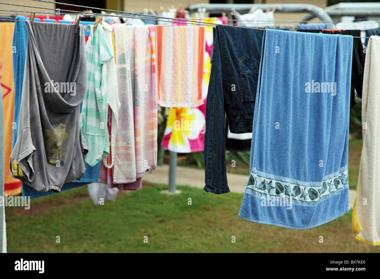 Clothes drying on a clothesline. Stock Photo
