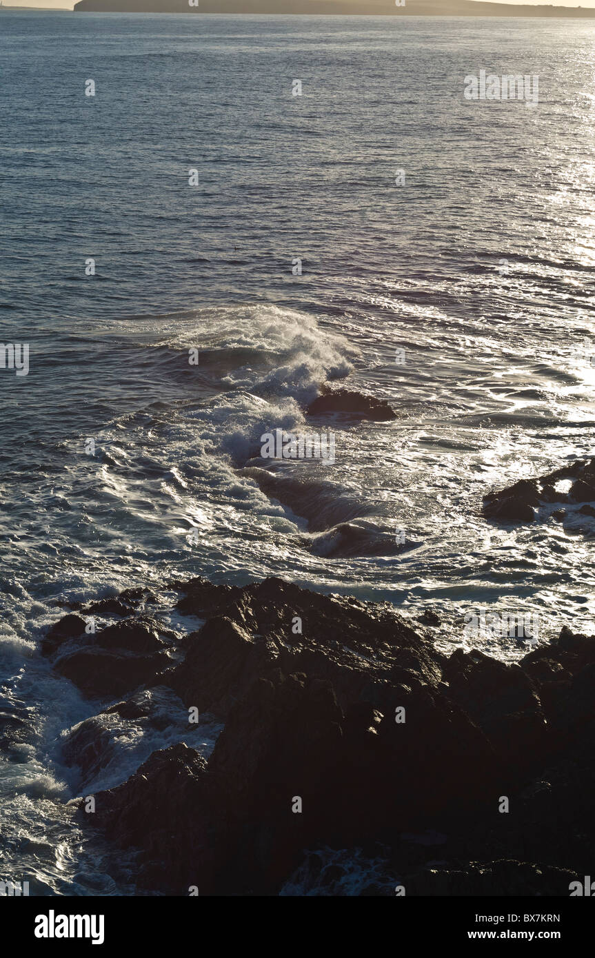 dh Grim Ness SOUTH RONALDSAY ORKNEY Seawaves surging over rocks rough sea Stock Photo
