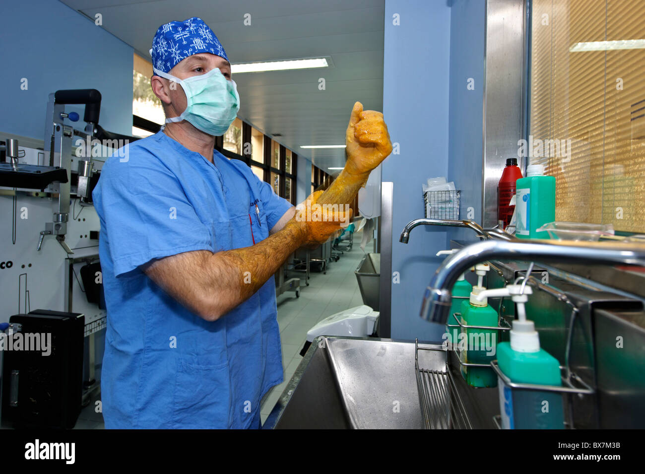 Surgeon scrubbing his hands before surgery Stock Photo Alamy