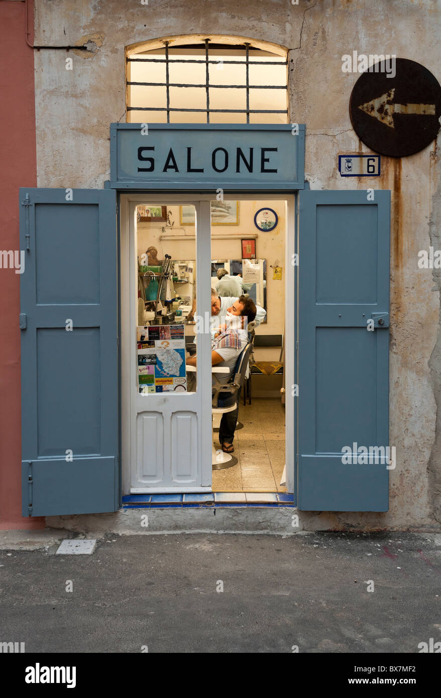 Traditional barber shop in the old town of Gallipoli, Puglia, Italy Stock Photo