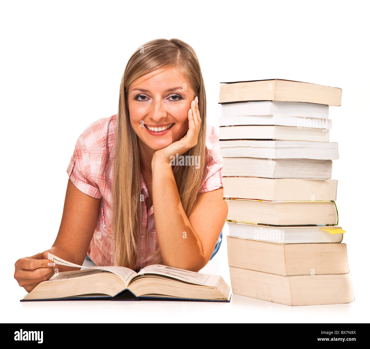 Young adult caucasian woman with books isolated on white Stock Photo