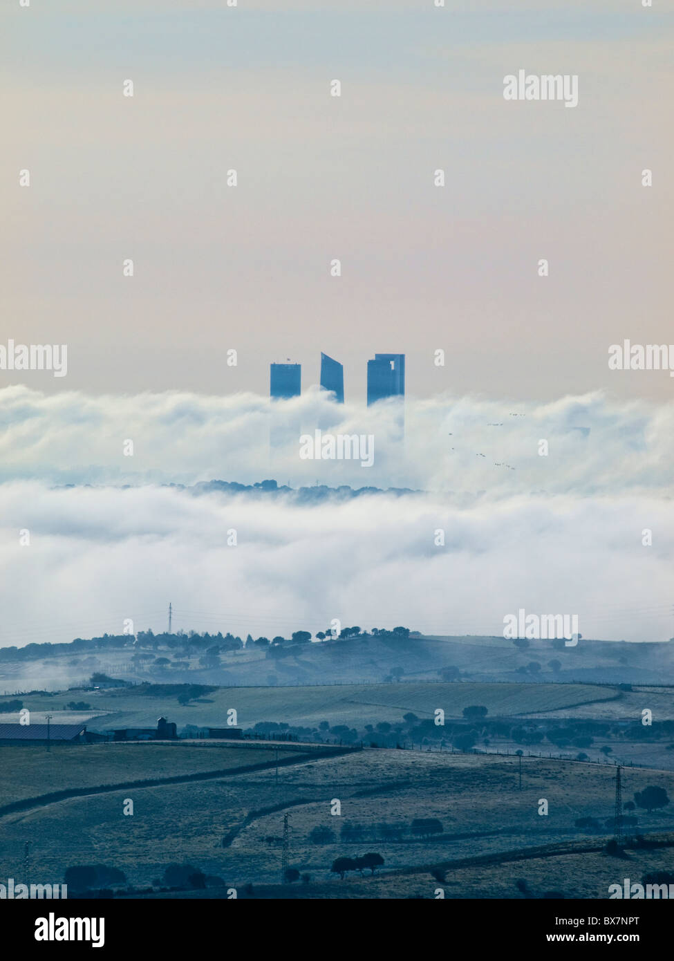 Madrid under clouds. The CTBA (Cuatro Torres Business Area) view from