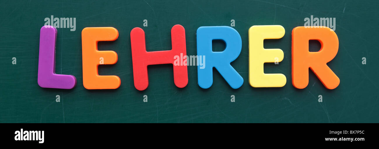 the-german-term-for-teacher-in-colored-letters-on-a-blackboard-stock