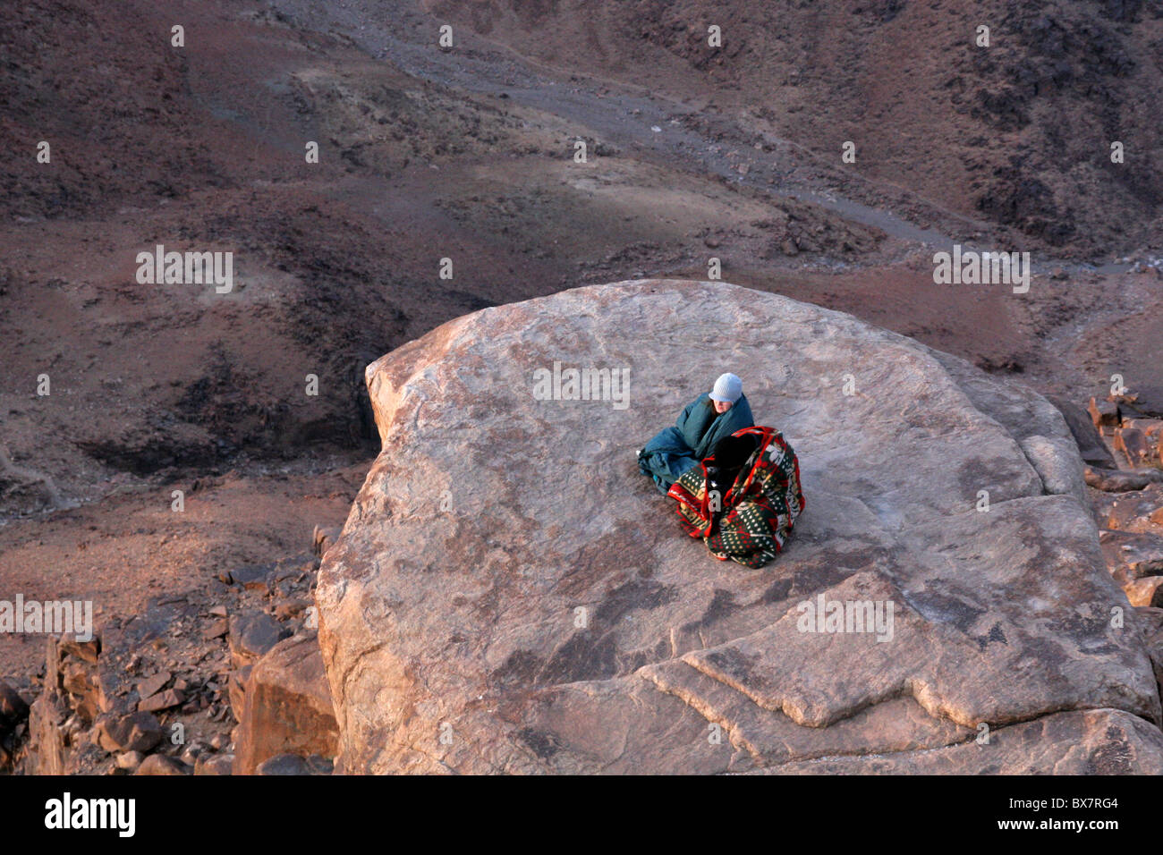 Dawn watchers on Mount Sinai, Jebel Musa or Mount Moses, in the Holy Mountains, Sinai Peninsular. Stock Photo