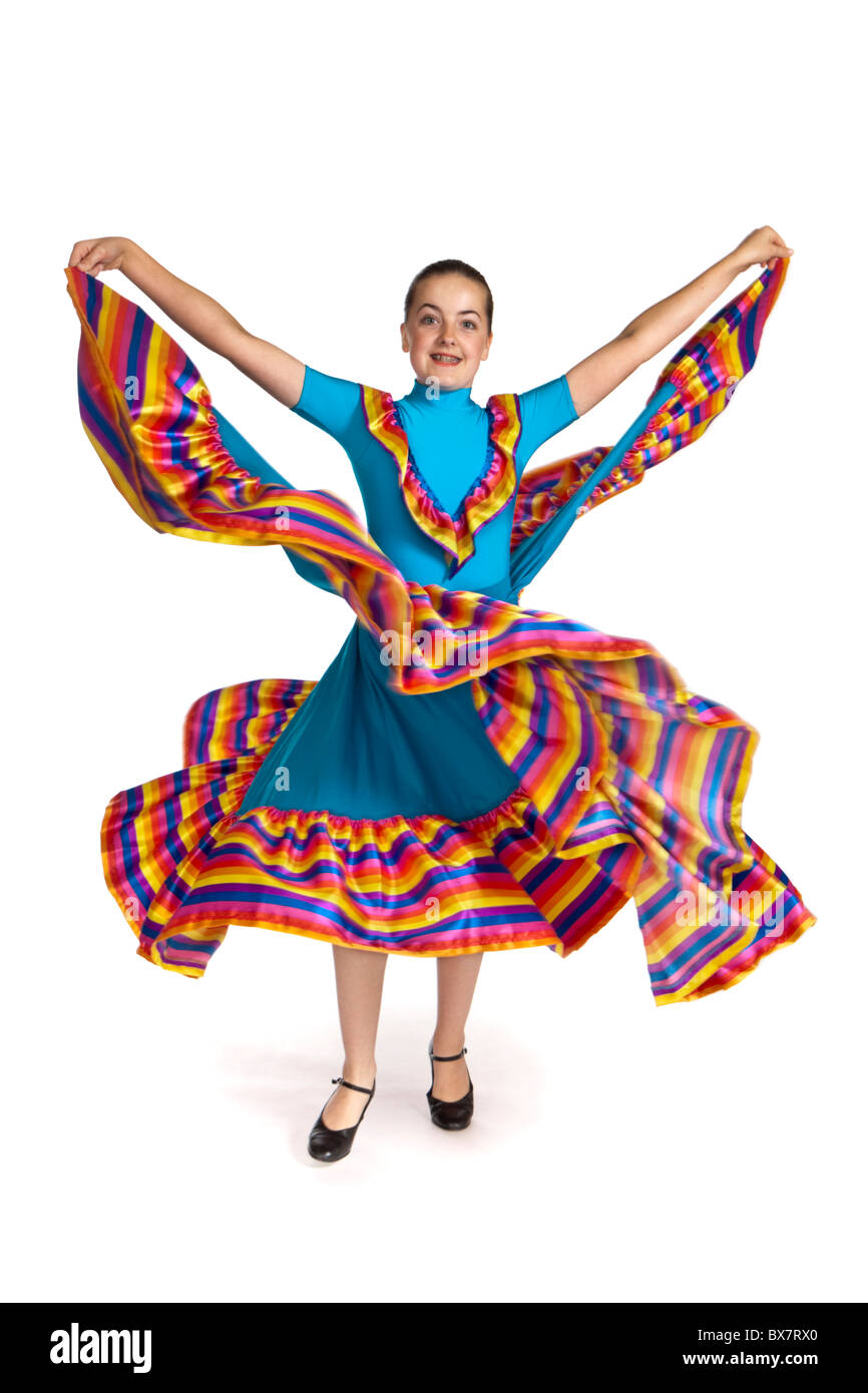 Studio shot of beautiful young girl in colourful Mexican national dancing costume Stock Photo