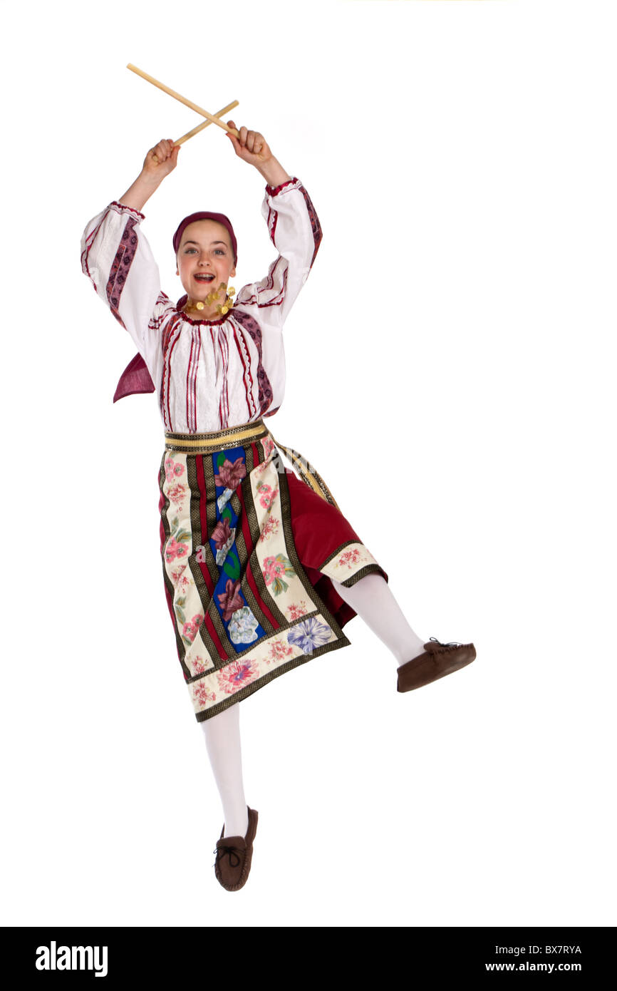 Studio shot of young girl in colourful Romanian national folk dancing costume Stock Photo