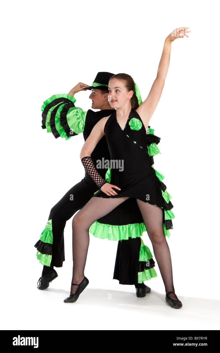 Studio shot of beautiful young identical twins in colourful modern / jazz dancing costume Stock Photo