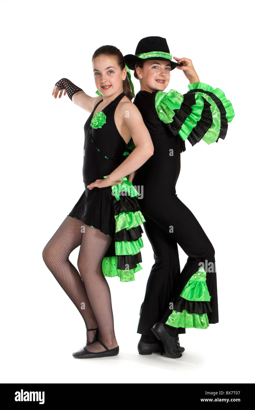Studio shot of beautiful young identical twins in colourful modern / jazz  dancing costume Stock Photo - Alamy