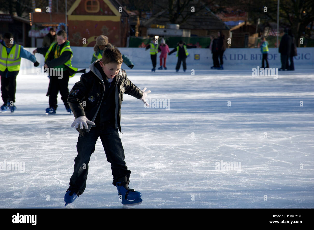 Boy iceskating, Hyde Park Winter Wonderland, London, UK Stock Photo