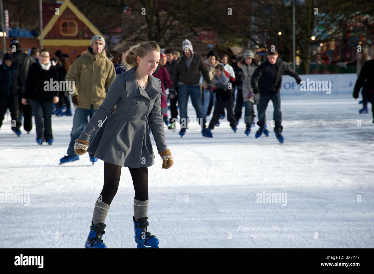 Girl Skating At The Hyde Park Winter Wonderland Ice rink London UK 