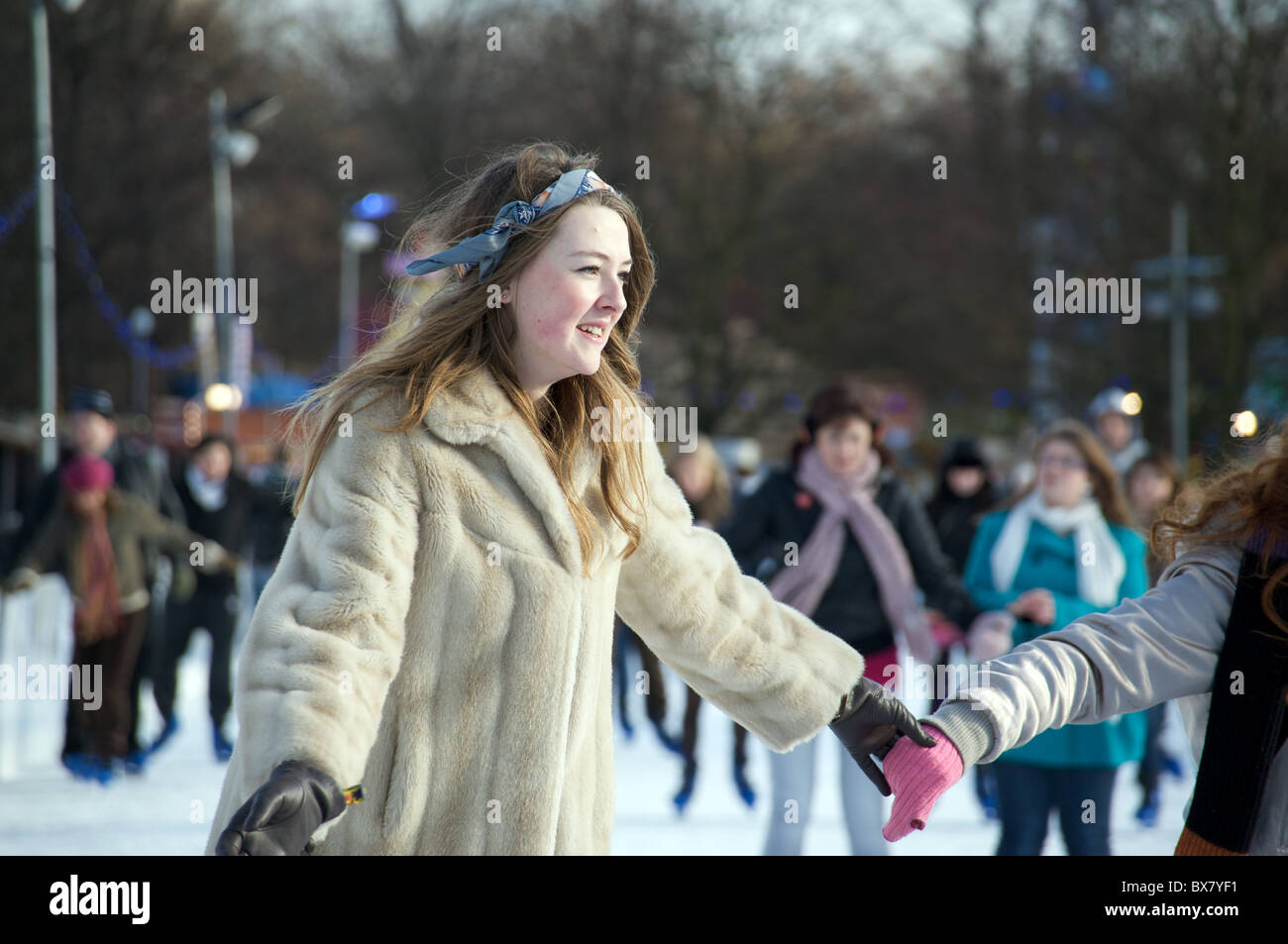 Woman Skating At The Hyde Park Winter Wonderland Ice rink London UK 